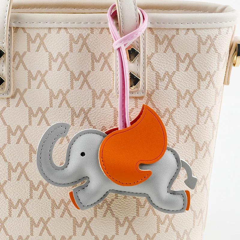 Mini PU Leather Flying Elephant Keychain Plush Bag Pendant Animal Charm for Car Keys and Handbags Pack of 2 - Image 3